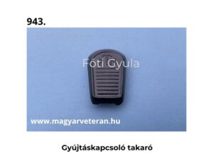 Gyújtáskapcsoló takaró fekete kivitelben veterán motorkerékpár kapcsoló alkatrészhez, világoskék háttéren fotózva.