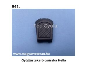 Gyújtástakaró csúszka Hella fekete kivitelben veterán motorkerékpár kapcsoló alkatrészhez, világoskék háttéren fényképezve.